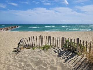 Sandstrand mit Meer und blauem Himmel © Biewer_Jürgen