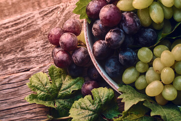 Tasty Grapes on Wooden table. High quality photo