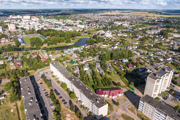 aerial panoramic view from a great height of a small provincial town with a private sector and high-rise apartment buildings