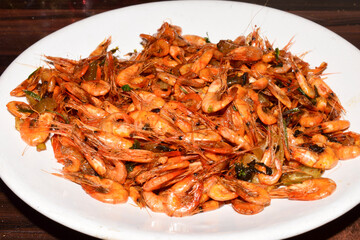 Testy river shrimps on white dish