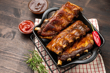 Roasted ribs with bbq sauce and ketchup