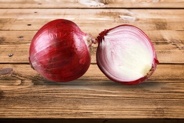 Delicious onions vegetables on the desk background