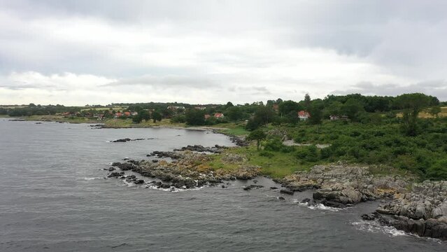 Flying over Bornholm, Denmark Island during summer. Coastline in the summer
