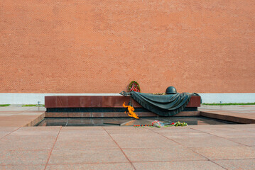 Tomb of the Unknown Soldier. Victory Day Memorial Eternal Fire in Moscow at the Kremlin on the Red...