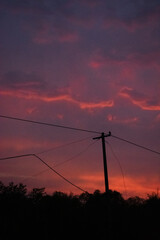 Silhouette of Telephone Pole after Sunset - Anime style Clouds on the Sky - Pink Clouds during Dawn - Fire in the sky
