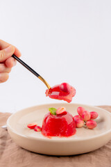 Jelly dessert with Fresh organic Carunda or Karonda fruits on white background