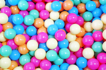 a collection of colorful small balls
