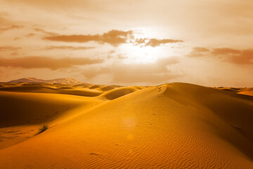 Fototapeta na wymiar Majestic beautiful scene of Merzouga dunes of Sahara desert Morocco.