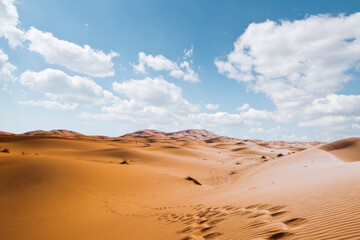 Obraz na płótnie Canvas Majestic beautiful scene of Merzouga dunes of Sahara desert Morocco.