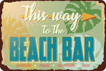 vintage grunge retro sign this way to the beach bar