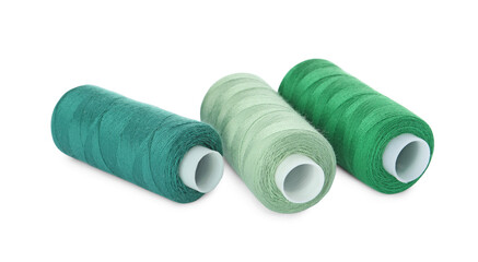 Different colorful sewing threads on white background