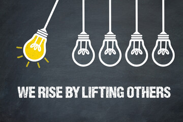 Fototapeta premium We rise by lifting others