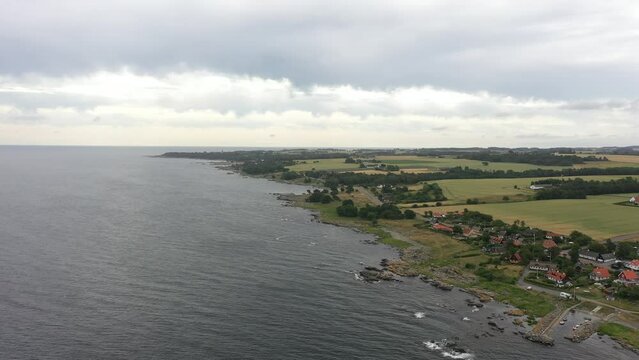 Drone footage over danish island of Bornholm. Summer day with cinematic drone movement.