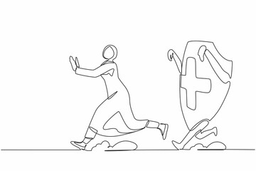 Continuous one line drawing fright Arabian businesswoman being chased by shield. Female employee afraid about increasing of healthcare insurance. Single line design vector graphic vector illustration