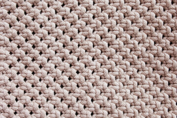 Handmade macrame pattern close up. Macrame braiding and cotton threads.  Female hobby.  ECO...