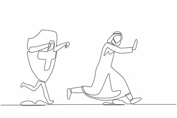 Single one line drawing unhappy Arab businessman being chased by shield. Difficult financial insurance. Expensive healthcare budget. Minimal metaphor. Continuous line draw design vector illustration