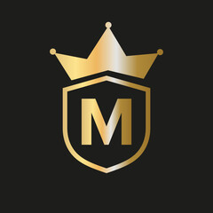 Shield Crown Logo On Letter M Vector Symbol With Elegant Gold Color