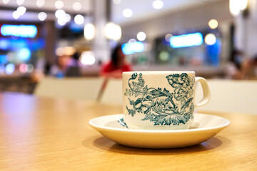 Cup of lemon tea with China style ornaments printed on it