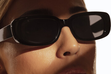 Fashion portrait of beautiful model with sunglasses. Fashion photo of young beautiful woman in...