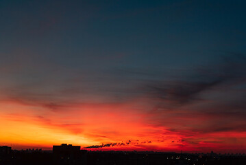 orange sunset over big city
