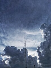 Radio towers on a cloudy background