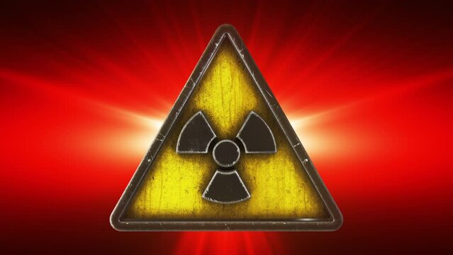 3D render animation of the radiation nuclear hazard symbol in a triangle on a red shiny background depicting the danger of nuclear contamination.