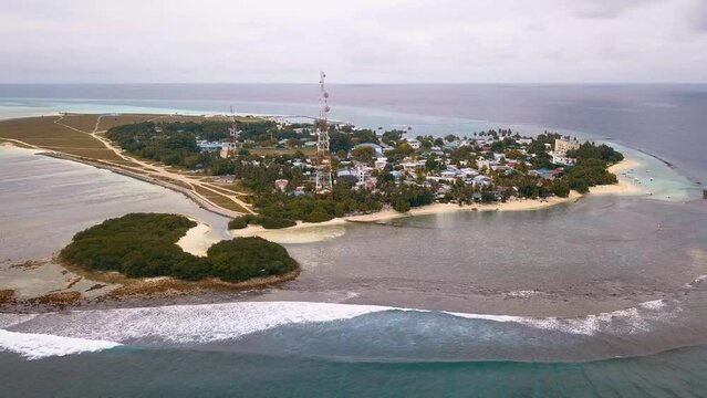 Drone shots of the Maldivian island Thuslusdhoo, near the capital Male, Maldives