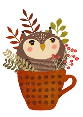 Cute owl sitting in a cup with autumn bouquet