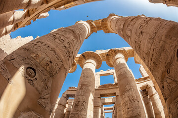 Different hieroglyphs on the walls and columns in the Karnak temple. Karnak temple is the largest...
