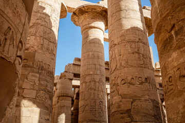 Different hieroglyphs on the walls and columns in the Karnak temple. Karnak temple is the largest complex in ancient Egypt.