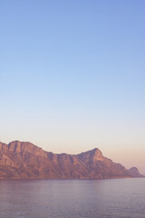 Naklejka premium Composition of landscape of mountains and sea