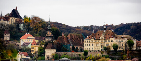 Ancient Sighisoara city in Romania, panoramic old clock tower, castle and medieval architecture...