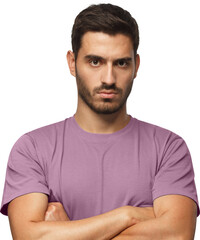 Young man in t-shirt tanding with arms crossed and serious concentrated face