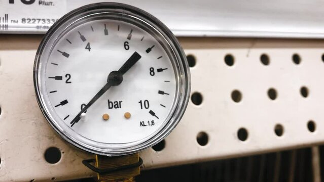 manometer radial measurement of liquid gas pressure. High quality 4k footage. industry metrology meter metering arrow digit bar