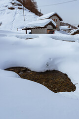 The snowy mountain of the Engadin, near the town of Sankt Moritz, Switzerland - March 2022