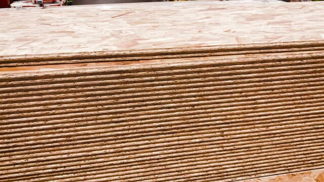 Oriented Strand Board osb sheets pack stack construction wood lumber 