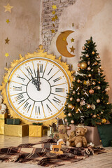 Stylish xmas living room interior with Christmas tree decorated with candles, garland. Big gold white clock, many gift boxes and present toys indoors. Decoration stars and moon on wall. New Year