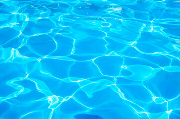 water in swimming pool rippled water detail background