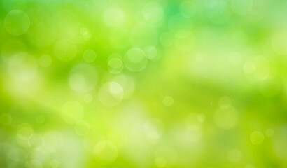 Fototapeta na wymiar Green bokeh background with circles. Spring and summer texture
