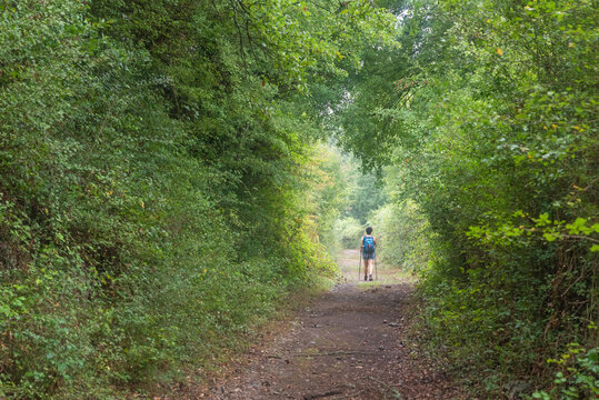 Hiker on the Delika Green Path at the foot of the Salto del Nervi&oacute;n
