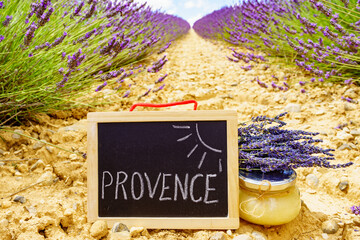 Jar with honey at lavender field in Provence France.