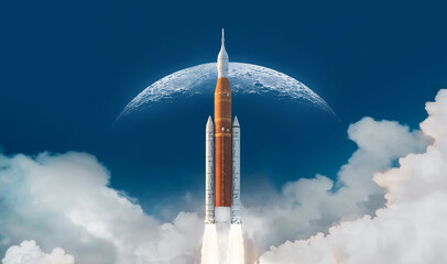 SLS space rocket in sky with clouds. Mission to Moon. Spaceship launch from Earth. Orion spacecraft. Artemis space program to research solar system. Elements of this image furnished by NASA