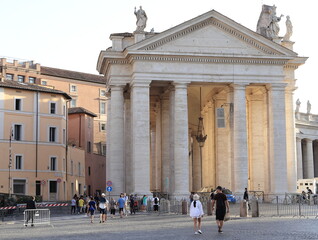 St. Peter's Square Street View with Colonnade Detail and People in Rome, Italy