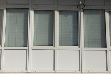 Plastic window. White window frames in building.