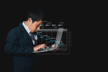 Businessman is browsing his computer laptop action Plan business strategy on virtual screen.