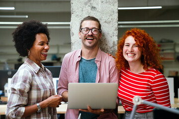 Smiling diverse colleagues gather in boardroom brainstorm discuss financial statistics together