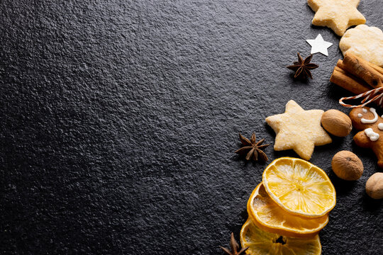 Image of christmas decoration and copy space on slate background