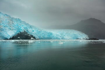 Snout of the Aialik glacier, Kenai peninsula Alaska in rainy weather
