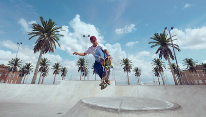 Skateboarder doing a trick in a skate park