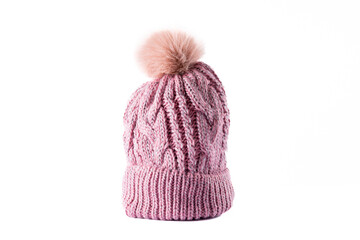Image of wool beanie with pom pom on white surface
